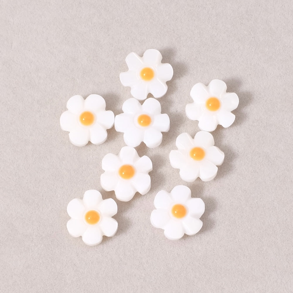 2 perles marguerite 12mm en Nacre naturelle blanche et émail orange