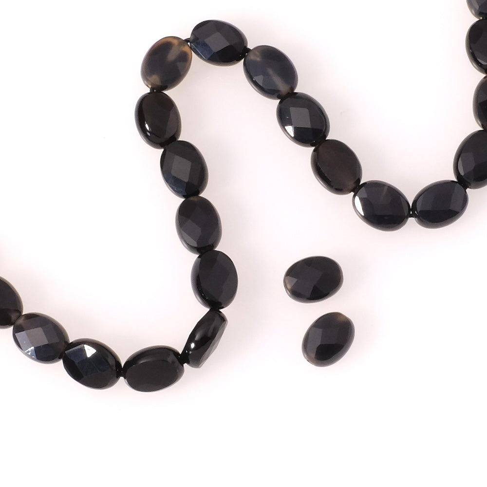 2 perles en pierre naturelle ovale facettée 6x8mm en Onyx noire