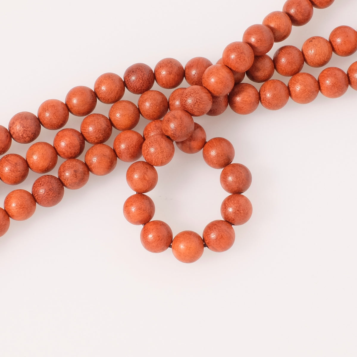 Fil de perles en bois rond 8mm orange rouge