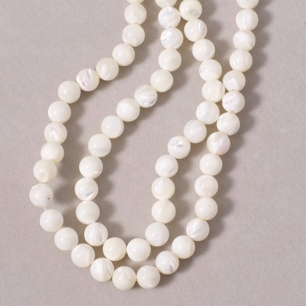 Fil de perles rondes 8mm en Nacre blanche